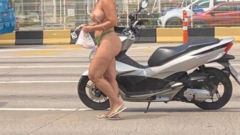 Mulher seminua surpreende ao atravessar 3º ponte de moto